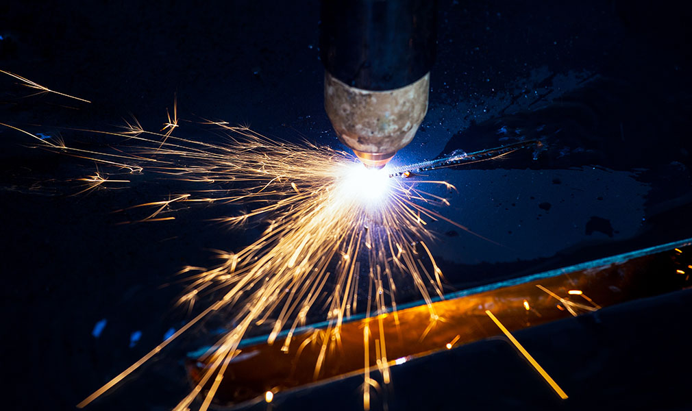 Industrial cnc plasma cutting of metal plate